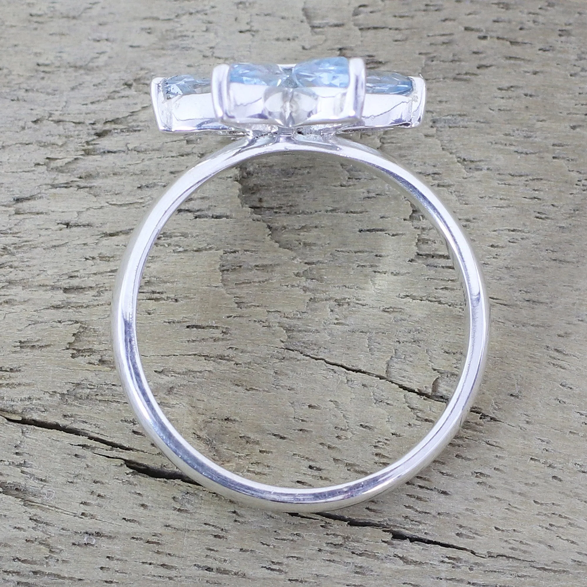 Blue Topaz and Sterling Silver Floral Ring from India - Sparkling Daisy | NOVICA
