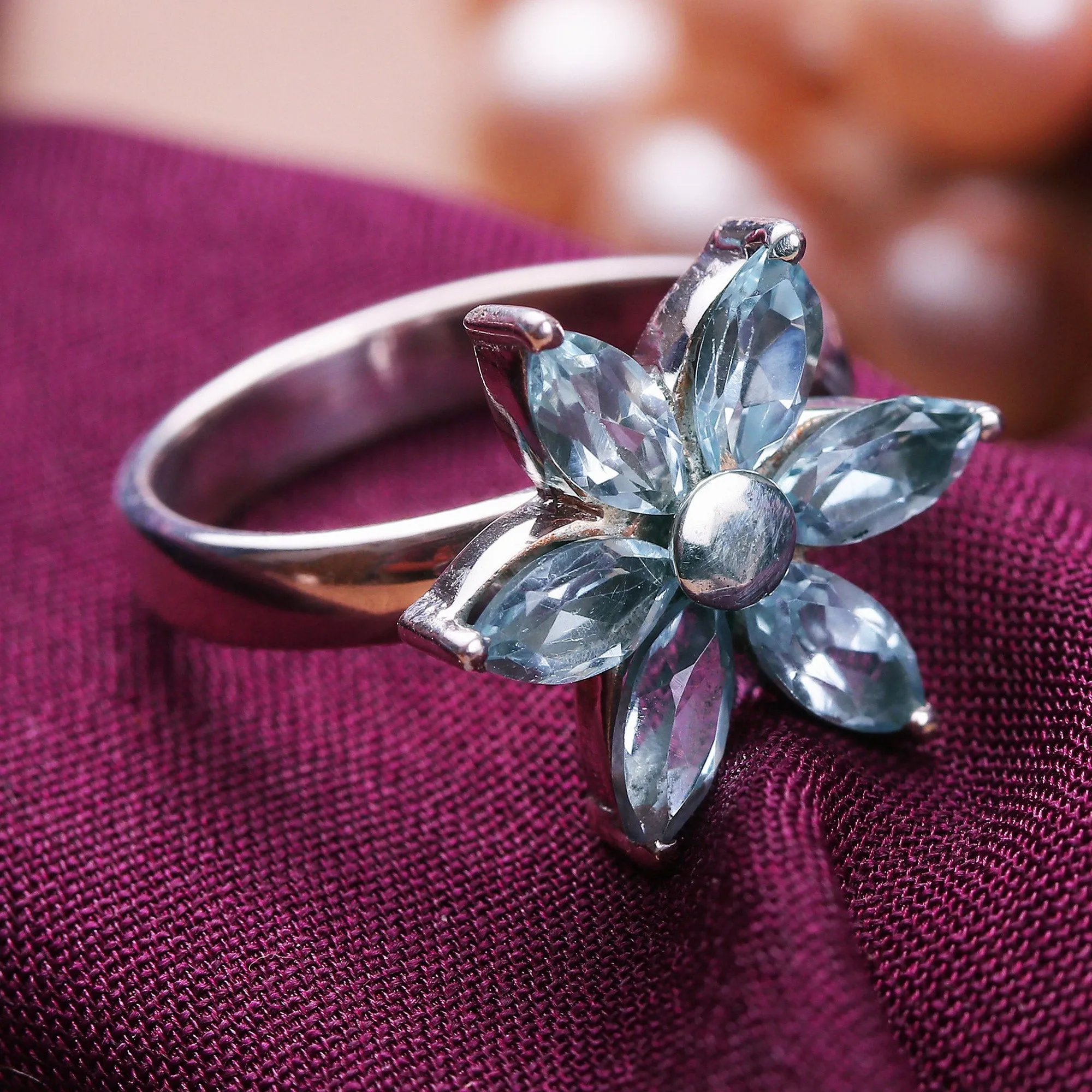 Blue Topaz and Sterling Silver Floral Ring from India - Sparkling Daisy | NOVICA