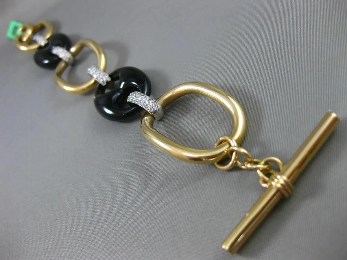 ESTATE EXTRA LARGE 1.50CT DIAMOND & ONYX 18KT TWO TONE GOLD OVAL TOGGLE BRACELET