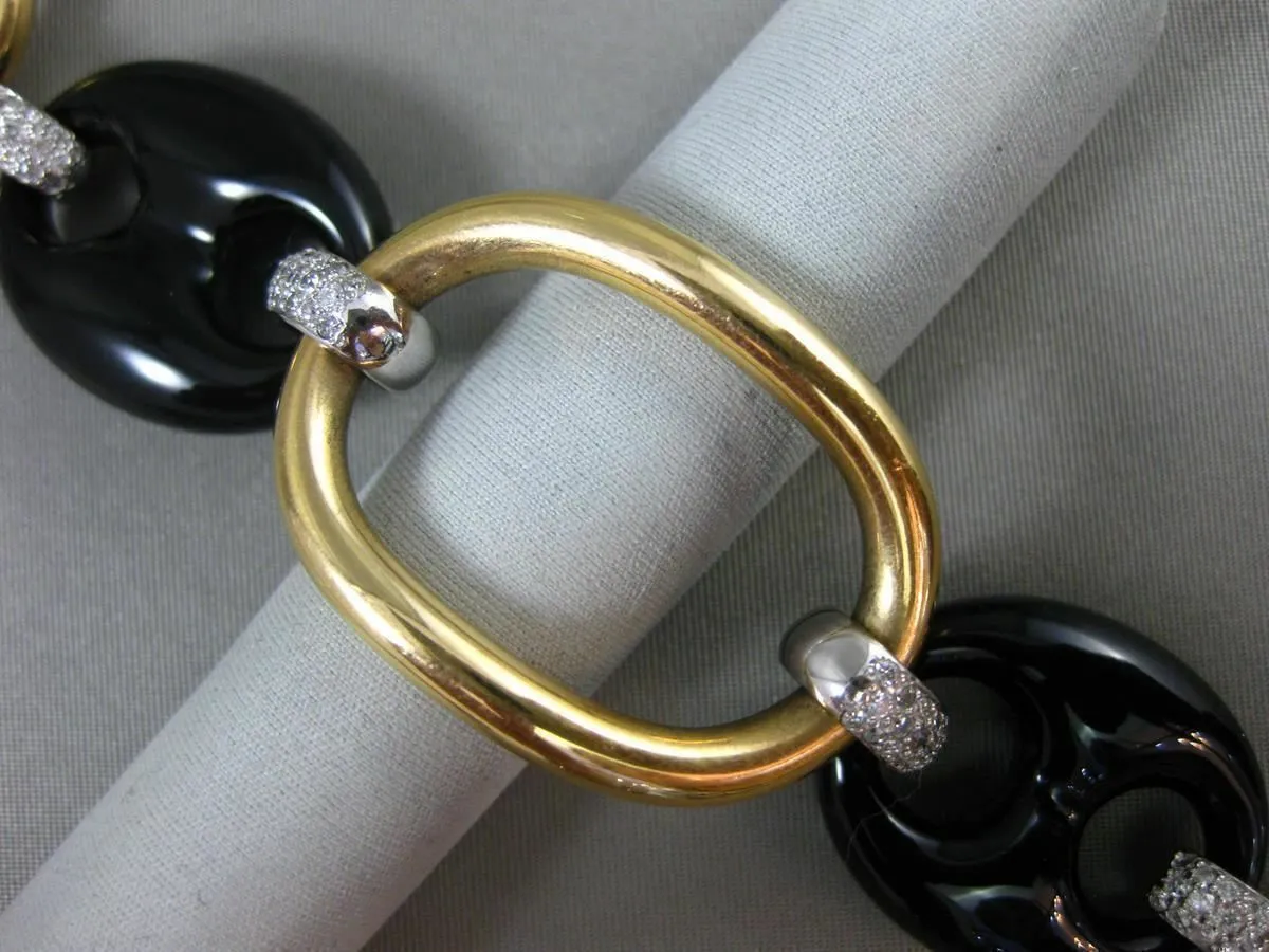 ESTATE EXTRA LARGE 1.50CT DIAMOND & ONYX 18KT TWO TONE GOLD OVAL TOGGLE BRACELET
