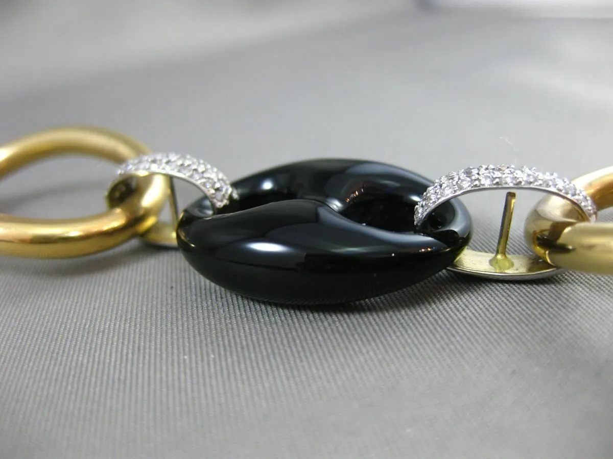 ESTATE EXTRA LARGE 1.50CT DIAMOND & ONYX 18KT TWO TONE GOLD OVAL TOGGLE BRACELET