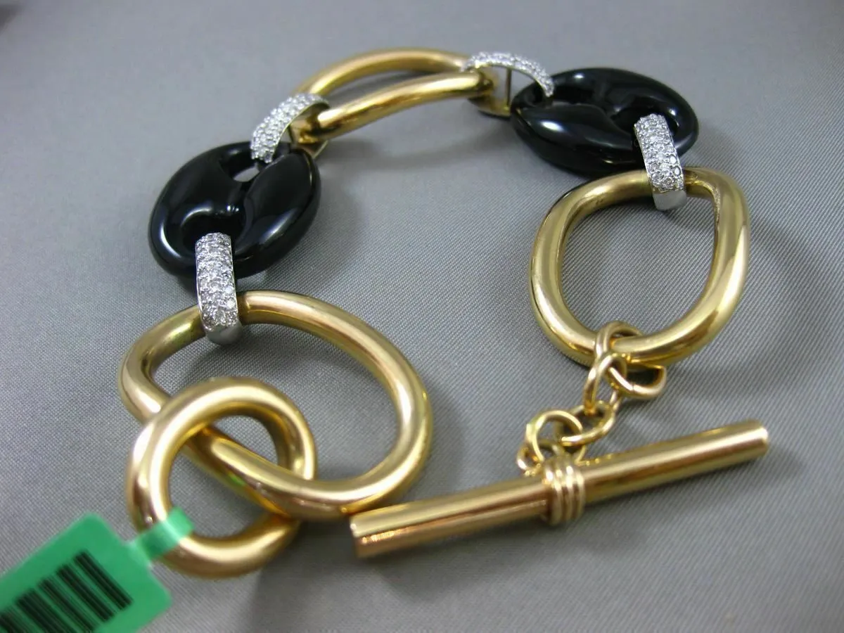 ESTATE EXTRA LARGE 1.50CT DIAMOND & ONYX 18KT TWO TONE GOLD OVAL TOGGLE BRACELET