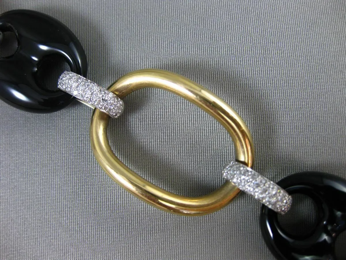 ESTATE EXTRA LARGE 1.50CT DIAMOND & ONYX 18KT TWO TONE GOLD OVAL TOGGLE BRACELET