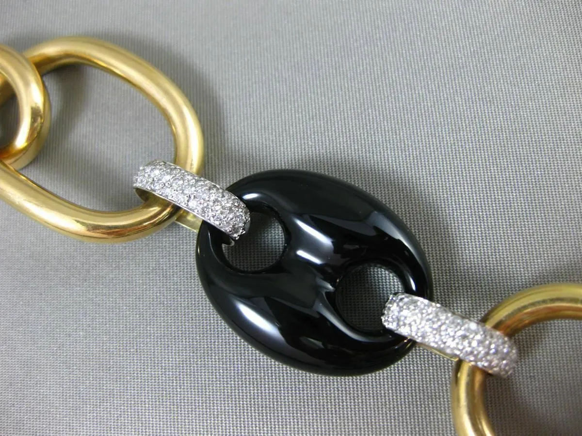 ESTATE EXTRA LARGE 1.50CT DIAMOND & ONYX 18KT TWO TONE GOLD OVAL TOGGLE BRACELET