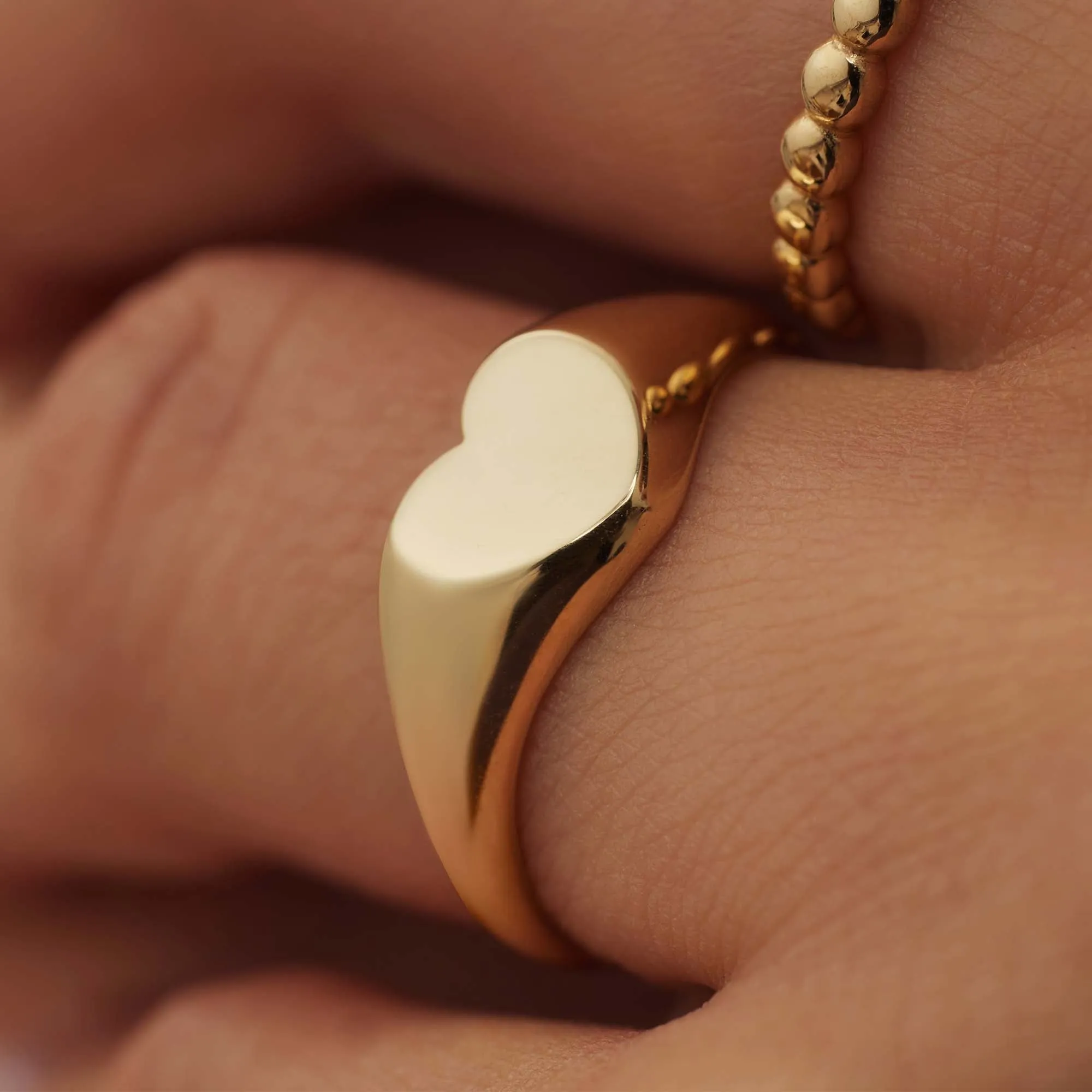Le Marais Lauren 14 karat gold signet ring with heart