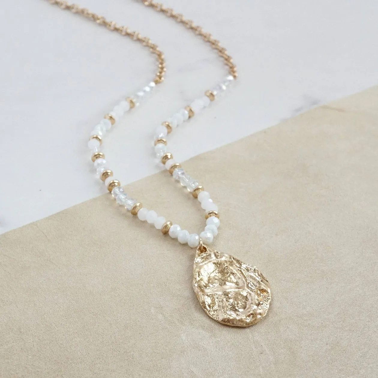 Long Beaded Necklace with Golden Teardrop Pendant