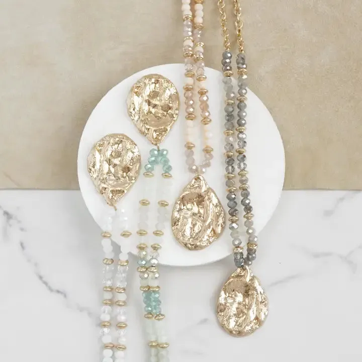 Long Beaded Necklace with Golden Teardrop Pendant