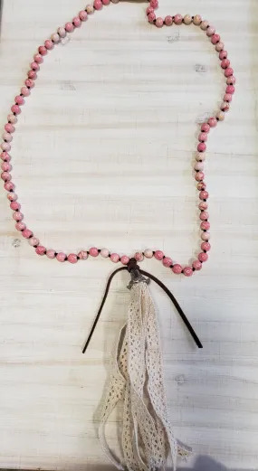 Pink beaded with cream tassel necklace